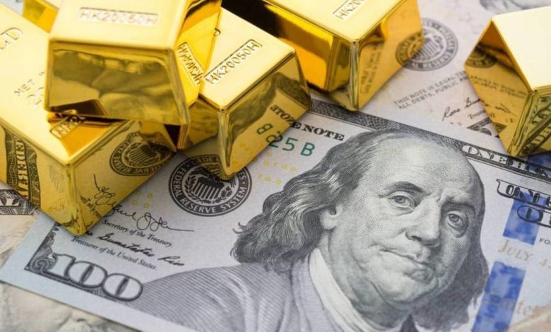 صورة انخفاض سعر الذهب وارتفاع الدولار برفع الفيدرالي الامريكي لسعر الفائده